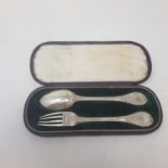 A pair of Edward VII silver spoons, Sheffield 1907, in a presentation case and various silver