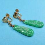 A pair of carved jade earrings Length - 44 mm
