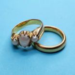 A 22ct gold wedding band, ring size approx. I½, and a yellow metal and seed pearl pearl ring, ring