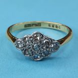 An 18ct gold and diamond cluster ring, ring size M