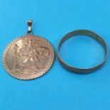 A 9ct gold wedding band, and a 9ct gold St Christopher pendant, 5.6 g