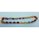 A 9ct gold and gemstone set bracelet