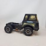 A Tonka Toys car transporter and other toys, play worn (box)