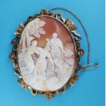 A 19th century cameo, carved a biblical scene, in a yellow metal mount, 7 x 6 cm