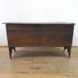 An 18th century oak coffer, 116 cm wide