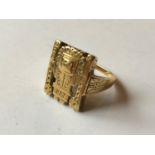 An 18ct gold Aztec style ring, 8.7 g Stamped 18ct, ring size M