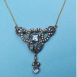 A modern Art Nouveau style pendant necklace, inset with white and blue stones Report by JS Note: