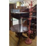 A painted metal coat stand, a mahogany Pembroke table, a round table, and a rosewood coal