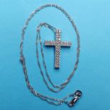 A 14ct white gold and diamond cross pendant and chain