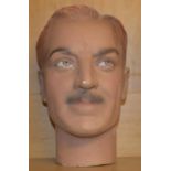 A 1930's/40's plaster shops display head, 32 cm high