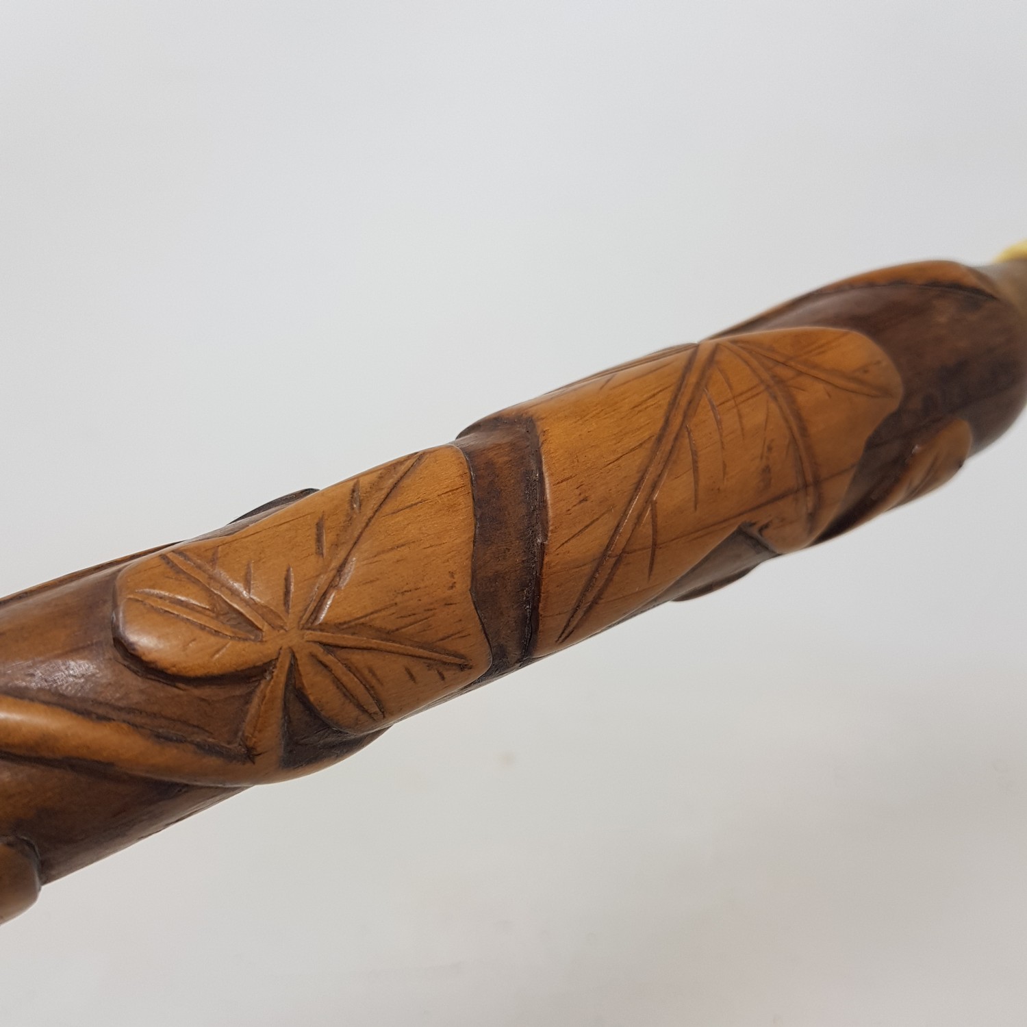 An Early 20th century walking stick, with carved ivory handle in the from of a hand, on a foliate - Image 6 of 6