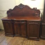 A 19th century mahogany serpentine sideboard, 190 cm wide 161 cm high 57 cm deep