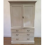 A painted linen press, having two cupboard doors above two short and two long drawers, 127 cm wide