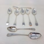 A set of eight silver Old English pattern tablespoons, some initialled, various dates and makers,