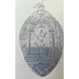 An 18th/19th century silver coloured metal Masonic medallion, engraved various symbols, 7 cm