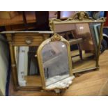 An early 20th century carved wood and gesso gilt framed wall mirror, 94 x 76 cm and four other