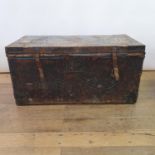 An 19th century leather and metal bound trunk, 92 cm wide, and a 19th century oak and metal bound