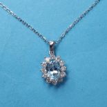 An 18ct white gold, aquamarine and diamond pendant necklace size of central stone 7.1mm by 5.1mm