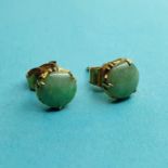 A pair of opal stud earrings