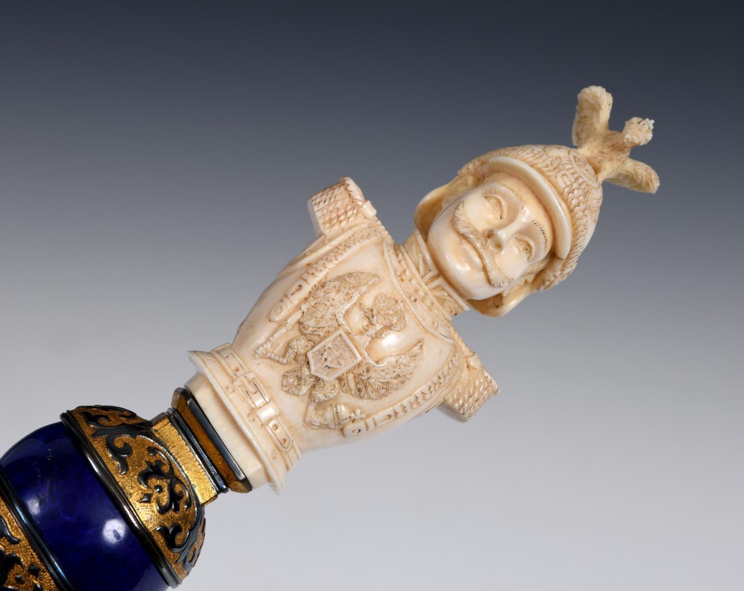 An important late 19th century Prussian marriage presentation cane, with a finely carved ivory
