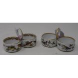 A pair of Meissen porcelain two section sweetmeat dishes, decorated birds and butterflies, 5.5 cm