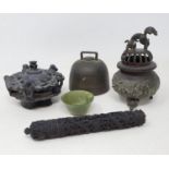 A small Chinese mutton fat jade bowl, 3 cm high, a bronze bell, with clapper, 8 cm high, a bronze