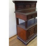 An early 20th century mahogany buffet, with raised back, and two drawers, above open section, and