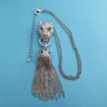 A modern silver coloured metal necklace, pendant in the form of a jaguar holding a tassel Report