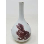 A Chinese baluster vase, decorated three Shi Shi dogs in underglaze copper-red, rim with chips and