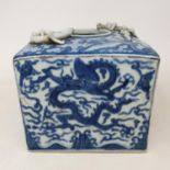 A Chinese blue and white square vase, with applied dragons, six character mark to base, 12 cm