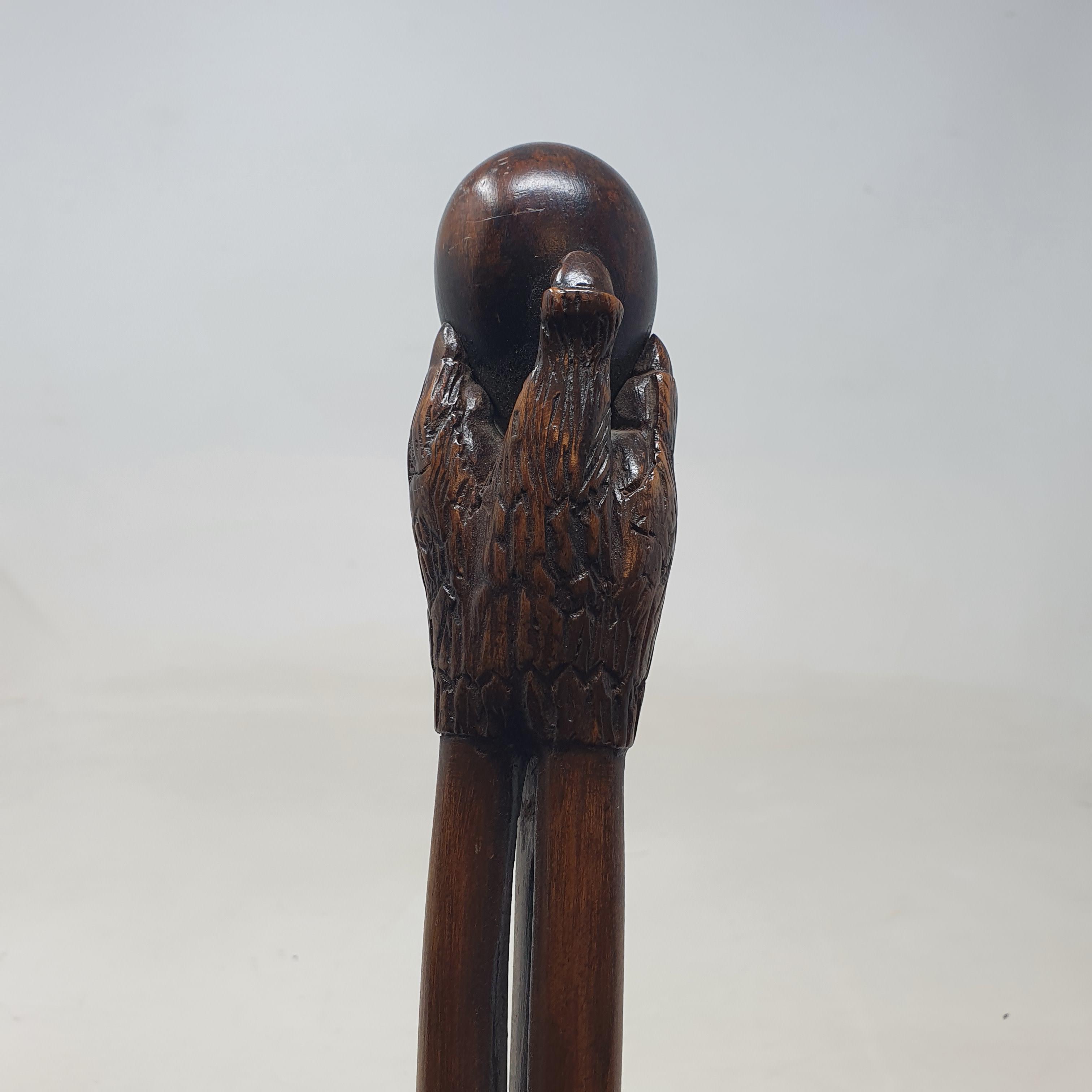 A 19th century folk art walking stick, the handle carved in the form of a talon gripping an egg, - Image 7 of 12