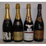 A bottle of Louis Roederer Champagne, 1989, a bottle of Veuve Cliquot, 1985, a bottle of