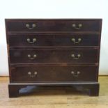 A George III mahogany chest, having four graduated drawers, on bracket feet, 116 cm wide