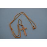A 9ct gold cross and chain, 9.4 g Chain 46 cm JS