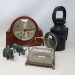 An Art Deco mahogany mantel clock, a brass oil lamp, two silver plated canteens of cutlery and other