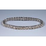 A 14ct white gold and diamond line bracelet, diamond weight approx. 21ct