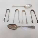 Four pairs of silver sugar tongs, and two silver tablespoons, various dates and makers, 11.2 ozt