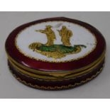 An oval enamel box, the cover decorated two figures, 12 cm wide