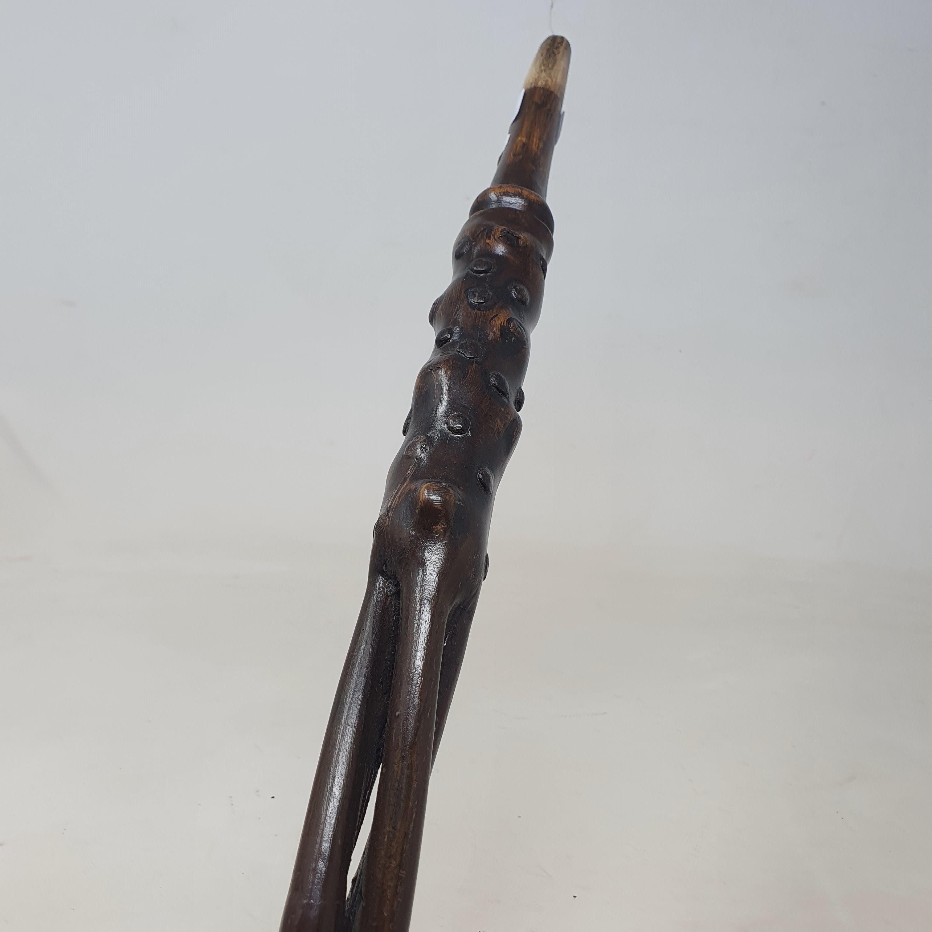 A 19th century folk art walking stick, the handle carved in the form of a talon gripping an egg, - Image 11 of 12