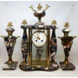 A French clock garniture, the clock with a 9 cm diameter enamel dial with Arabic numerals, in a