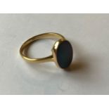 An 18ct gold and opal ring, 3.3 g (all in) RB Ring size approx. R, generally good condition, a