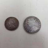A Queen Anne half crown, 1709 and a shilling, 1711 (2)