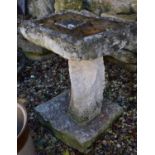 A composite stone bird bath, 70 cm high