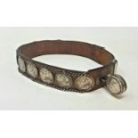 An unusually large 19th century dog collar, mounted with crown coins dating from 1821, engraved '