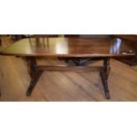 An Ercol dining table, 184 cm wide