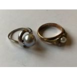 An 8ct gold and seed pearl ring, 4.2 g, and another ring (2)