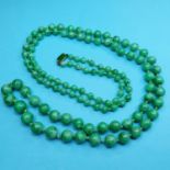 A jade bead necklace