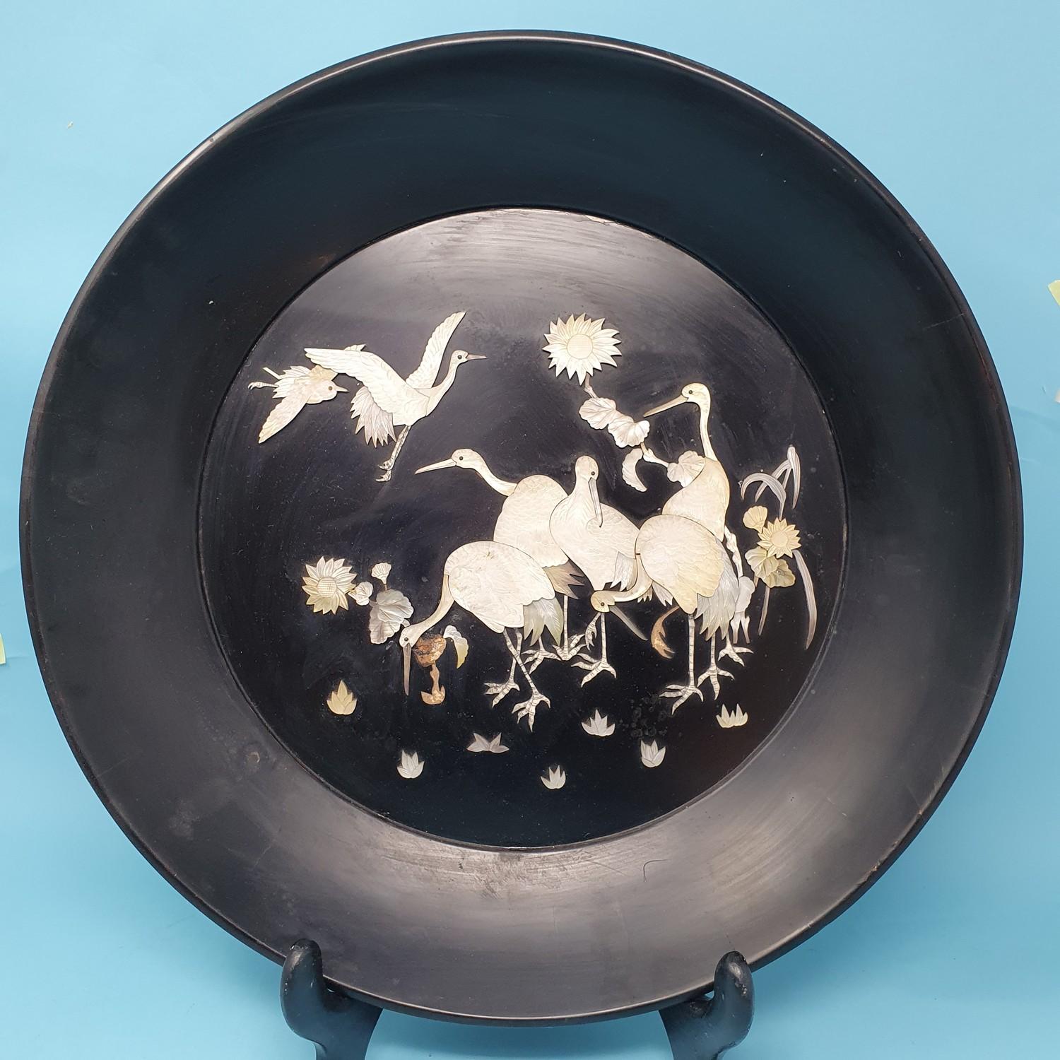 An early 20th century Japanese black lacquered plaque, decorated cranes and flowers, 40 cm - Image 5 of 7