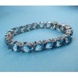 A modern silver coloured metal and topaz bracelet Report by JS Note: this is 20th/21st century