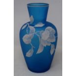 A blue cameo style glass vase, painted flowers, 18 cm high
